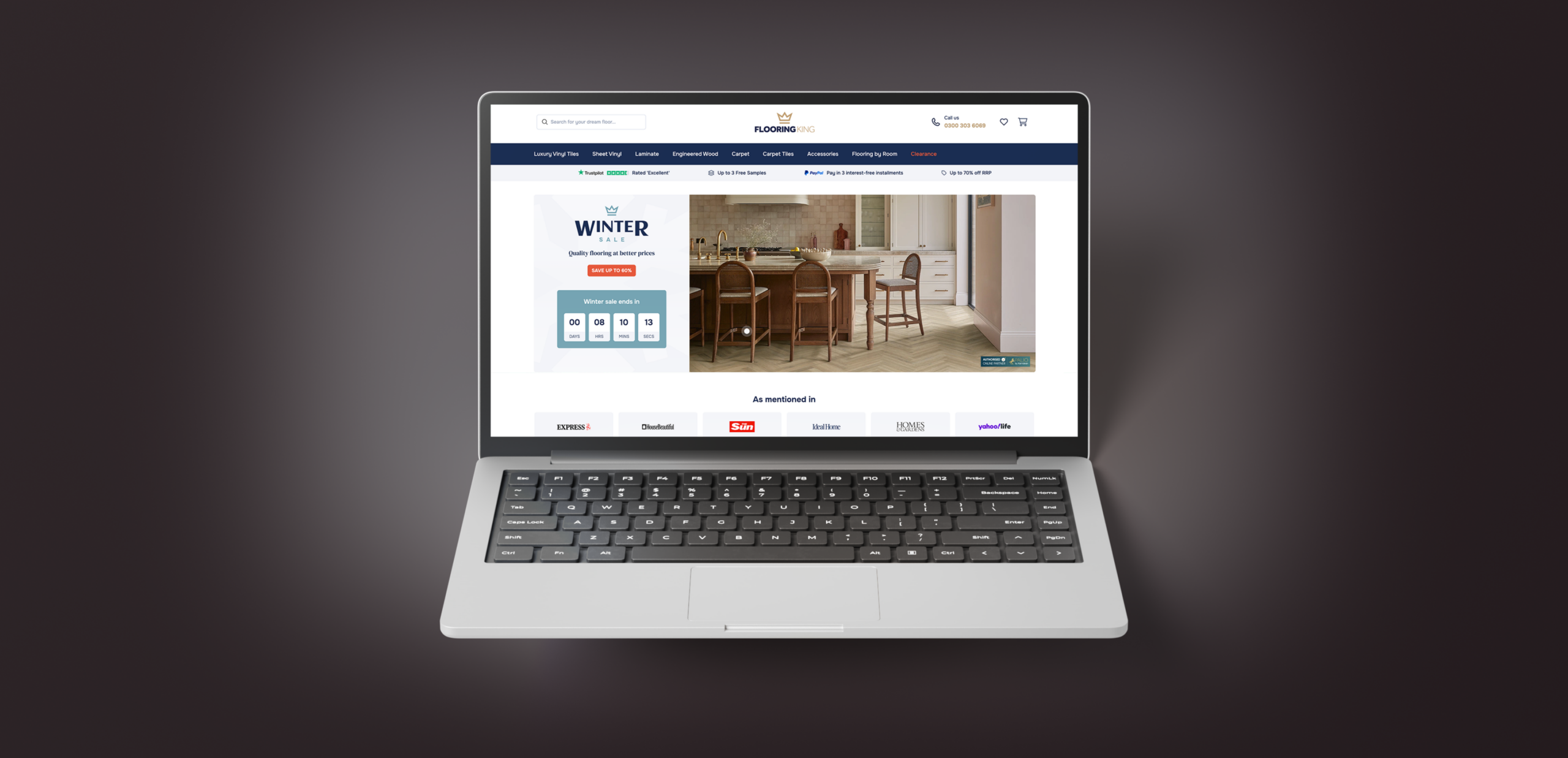 Custom Flooring King WordPress website displayed on a laptop screen